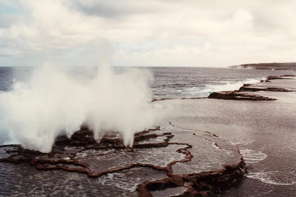 Ocean spray rising from Mapu'a 'a Vaea blowholes on Tongatapu, Tonga